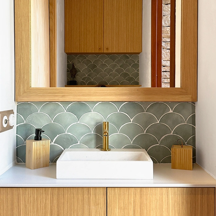 Turquoise zellige tiles on bathroom backsplash